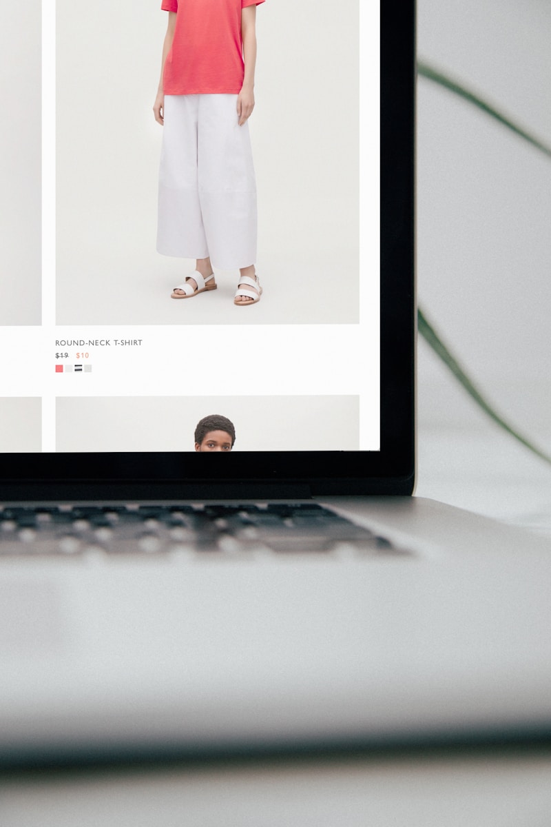 laptop computer displaying pants on eshop, eshop styling, e-shop, ecommerce, e-commerce styling, online store