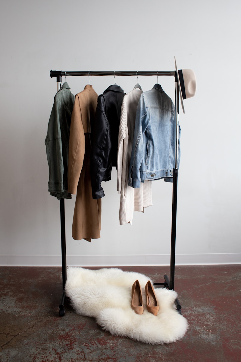 five jackets on clothes rack, items separated during personal styling session, personal styling, wardrobe editing, event styling
